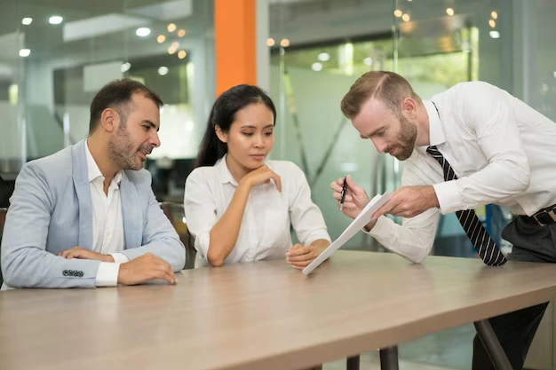 business-man-presenting-idea-his-coworkers-office